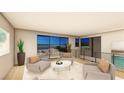 Bright living room with stylish seating, balcony access, and stunning views of the water at 20 Lakefront Dr, Henderson, NV 89011