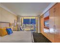 Bright main bedroom featuring a spacious built-in closet and expansive windows with a city view at 2000 Fashion Show Dr # 4106, Las Vegas, NV 89109
