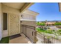 Condo entryway featuring a decorative security door, providing safety with an elevated view at 2325 Windmill Pkwy # 1622, Henderson, NV 89074
