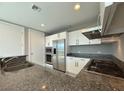 Well-equipped kitchen with stainless steel appliances and granite countertops for modern living at 4525 Dean Martin Dr # 2704, Las Vegas, NV 89103