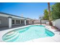 Refreshing backyard pool with a clean design and plenty of space for relaxation at 9728 Drumcannon Ave, Las Vegas, NV 89129