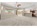 Spacious living room featuring an open layout with backyard views at 10348 Hawks Wing St, Las Vegas, NV 89178
