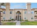 Attractive condo building with well-kept landscaping and visible unit numbers at 3145 E Flamingo Rd # 1045, Las Vegas, NV 89121