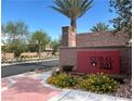 Entrance to Coral Bay, a B.H. Horton community, showcasing lush landscaping and attractive signage at 6682 Salt Pond Bay St, Las Vegas, NV 89149