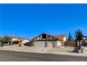Charming single-story home with a two-car garage and desert landscaping at 8517 Soneto Ln, Las Vegas, NV 89117
