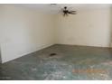 Empty living room with neutral walls and a ceiling fan at 3175 Palmdale St, Las Vegas, NV 89121