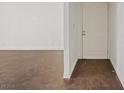 Condo entrance featuring new hard wood floors and freshly painted white door at 5200 Indian River Dr # 301, Las Vegas, NV 89103