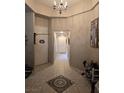 Inviting hallway with tile flooring, neutral walls, and recessed lighting at 8277 Orange Vale Ave, Las Vegas, NV 89131
