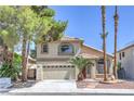 Lovely two-story home boasting a manicured front yard and a convenient two-car garage at 8712 Texas Bronco Ave, Las Vegas, NV 89129