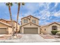 Charming two-story home featuring a two-car garage and desert landscaping at 9129 Patrick Henry Ave, Las Vegas, NV 89149