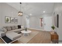 Inviting living room features a comfortable sectional sofa and modern decor at 9513 Yucca Blossom Dr, Las Vegas, NV 89134