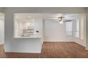 Bright living room with an open floor plan, a breakfast bar, and lots of natural light at 2050 W Warm Springs Rd # 4512, Henderson, NV 89014