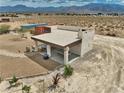 Aerial view of a modern outbuilding with pool table and covered parking at 3301 Underbrush Ave, Pahrump, NV 89048