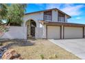 Two-story home with a two-car garage and gated entry at 3746 E Harmon Ave, Las Vegas, NV 89121