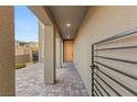 Covered entryway with a paved walkway and a stylish front door at 389 Red Feather Peak Ct, Las Vegas, NV 89138
