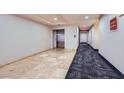 Hallway with elevators and directional signage for units at 43 E Agate Ave # 302, Las Vegas, NV 89123