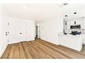 Spacious living area with sleek floors and contemporary design elements, providing an open feel at 5078 Mountain Vista St, Las Vegas, NV 89120