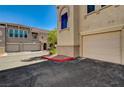 Lovely townhome complex with private garage and well maintained desert landscaping at 10550 W Alexander Rd # 2220, Las Vegas, NV 89129