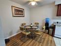 Bright dining area with a round table, seating for four, and stylish decor at 2451 N Rainbow Blvd # 1123, Las Vegas, NV 89108
