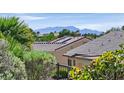 Rooftop view showcasing solar panels, tile roofing, and scenic mountain views from the property at 2548 Leighton Ave, Henderson, NV 89052