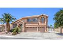Charming two-story home with a three-car garage, desert landscaping, and a mature palm tree at 2728 Aspen Wood Ave, Henderson, NV 89074
