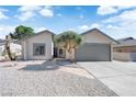 Attractive single-story home with low maintenance desert landscaping at 3115 Floral Vista Ave, Henderson, NV 89014