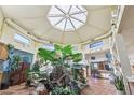 Bright atrium with a skylight and interior garden, perfect for a peaceful retreat at 55 Siddall Ave, Las Vegas, NV 89183