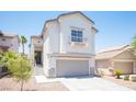 Inviting two-story home with a well-maintained front yard and a convenient two-car garage at 7021 Salt Marsh Ct, Las Vegas, NV 89148