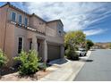 Charming two-story home featuring a balcony and a two-car garage at 9165 Beauchamp Ave, Las Vegas, NV 89148