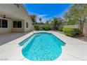 Sparkling private pool surrounded by lush landscaping in the backyard at 9632 Cherry Canyon Ave, Las Vegas, NV 89129