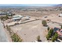 Aerial view of an expansive property with a home and large lot at 1106 E Athens Ave, Henderson, NV 89015