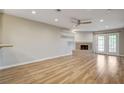 Bright living room with wood floors, fireplace, and white trim at 2785 Carnation Ln # 0, Henderson, NV 89074