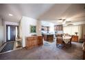 Cozy living area with a view to the kitchen, showcasing a functional layout and comfortable design at 3484 Anthony Dr, Las Vegas, NV 89121