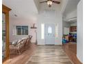Bright entryway features wood-look floors, high ceilings and decorative front door at 3821 Tumbleweed Ave, Pahrump, NV 89048