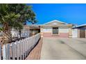 Charming single-story home featuring a well-maintained front yard and a long, spacious driveway at 5121 Gains Mill St, Las Vegas, NV 89122