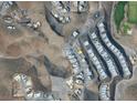 Aerial view of a desert community showing a vacant lot at 654 Dragon Peak Dr, Henderson, NV 89012