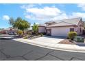 Well-maintained single-story home with a spacious driveway and a two-car garage at 786 Craigmark Ct, Henderson, NV 89002