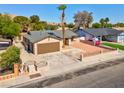 Single-story house featuring low-maintenance desert landscaping and gated front yard at 809 Greenbrook St, Las Vegas, NV 89110