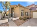 A quaint single-Gathering home featuring a fenced yard and a well-maintained exterior at 9220 Pitching Wedge Dr, Las Vegas, NV 89134