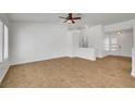Bright and airy living room featuring tile flooring, recessed lighting, and easy access to the entry way at 2059 Joy View Ln, Henderson, NV 89012