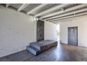 Secure carport area with decorative metal door and access to additional storage or utility rooms at 2313 Van Patten Pl, Las Vegas, NV 89104
