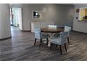 Cozy dining area with a stylish table and chairs set on a hardwood floor at 2851 S Valley View Blvd # 1134, Las Vegas, NV 89102