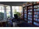 Inviting library space with large windows, comfortable seating, and extensive bookshelves at 2851 S Valley View Blvd # 1134, Las Vegas, NV 89102