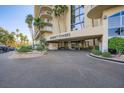Circular driveway leading to the Regency Towers entrance with lush landscaping at 3111 Bel Air Dr # 201, Las Vegas, NV 89109
