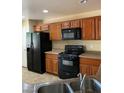Spacious kitchen with stainless steel appliances and ample counter space at 3813 Juanita May Ave, North Las Vegas, NV 89032