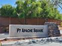 Stone community sign for FT Apache Square surrounded by mature trees and lush landscaping at 9321 Lady Finger Ct, Las Vegas, NV 89149