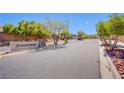 Ft Apache Square entrance sign with lush greenery and a secured gate at 9321 Lady Finger Ct, Las Vegas, NV 89149