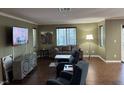Comfortable living room with a large window and modern decor at 10725 Wrigley Field Ave, Las Vegas, NV 89166