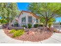 Well-maintained corner lot with mature trees and manicured landscaping at 2154 Idaho Falls Dr, Henderson, NV 89044