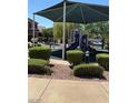 Community playground with modern equipment, shade structure, and secure rubber flooring at 252 Quail Ranch Dr, Henderson, NV 89015